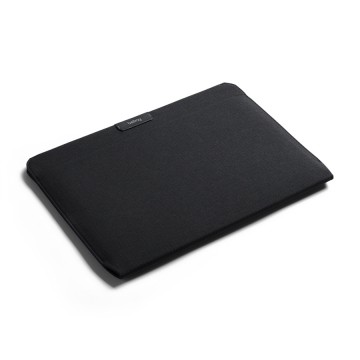 Laptop Sleeve:  Cover and prorect your laptop in a tailored, easy access sleeve without the bulk. The magnetic closure lets you...