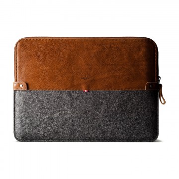 50/50 MacBook Pro Sleeve:  The 50/50 Sleeve combines rich leather with felted wool, classic tan with melange grey, smooth and rough textures....
