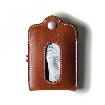 Thumbs Up Card Case:  Closed with a pushbutton, the Thumbs Up card case holds around 5 cards and banknotes. It features a pocket on the...