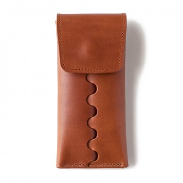 Watch Pouch Buttero:  Handcrafted to hold a single timepiece, the watch pouch joins a single panel of leather using a unique interlocking...